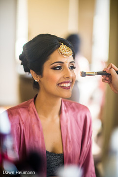 Joyful Indian bride with her makeup done capture. Joyful Indian bride with her makeup done capture.