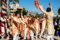 Joyful Indian groom with groomsmen during baraat celebration. Joyful Indian groom with groomsmen during baraat celebration.