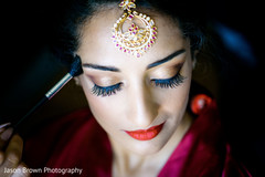 Lovely bride getting her makeup done Lovely bride getting her makeup done