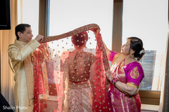 Indian bride putting Ghoonghat capture. Indian bride putting Ghoonghat capture.