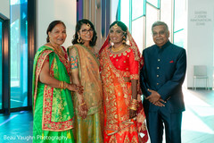 Elegant indian bride with parents portrait. Elegant indian bride with parents portrait.