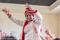Indian groom dancing during baraat Indian groom dancing during baraat