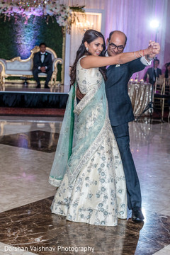 Indian bride dancing with her father Indian bride dancing with her father