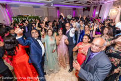 Indian wedding guests dancing Indian wedding guests dancing