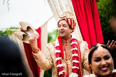 Indian groom getting his juttis back Indian groom getting his juttis back