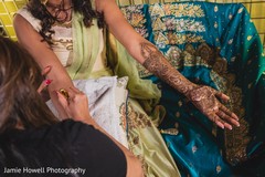 Magnificent Indian bridal henna art done on her hands. Magnificent Indian bridal henna art done on her hands.
