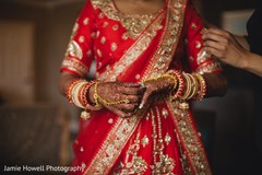 Dazzling Indian bride putting her ring on. Dazzling Indian bride putting her ring on.