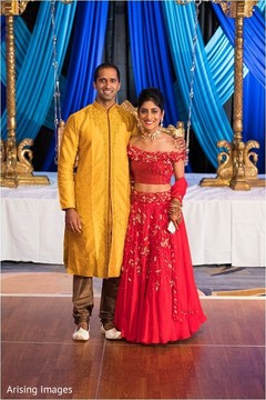 Joyful Indian bride on their sangeet outfits capture. Joyful Indian bride on their sangeet outfits capture.