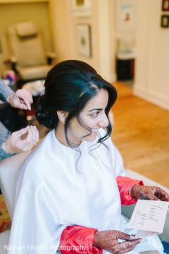Beautiful indian bride being dolled up for her ceremony Beautiful indian bride being dolled up for her ceremony