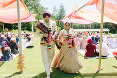 Sweet indian couple leaving wedding ceremony Sweet indian couple leaving wedding ceremony