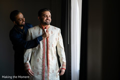 Enhancing Indian groom getting ready for wedding ceremony. Enhancing Indian groom getting ready for wedding ceremony.
