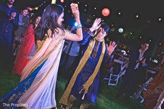 The newlyweds dance during sangeet The newlyweds dance during sangeet