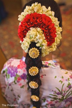 Beautiful detail of the flower arrangement used by the Indian bride. Beautiful detail of the flower arrangement used by the Indian bride.