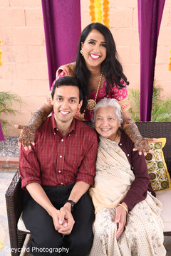 Lovely family portrait while in mehndi party. Lovely family portrait while in mehndi party.