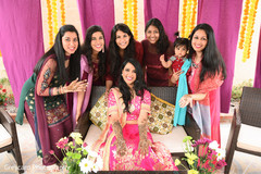 Wonderful Indian bride with bridesmaids with henna art capture. Wonderful Indian bride with bridesmaids with henna art capture.