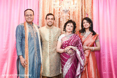 Indian groom with family portrait. Indian groom with family portrait.