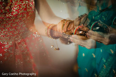 Indian bride putting bangles capture. Indian bride putting bangles capture.