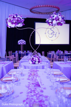 Stunning Indian wedding reception table centerpiece capture. Stunning Indian wedding reception table centerpiece capture.