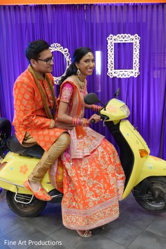 Lovely Indian couple on a scooter capture. Lovely Indian couple on a scooter capture.