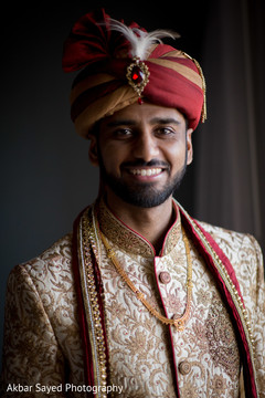 Elegant portrait of the Indian groom wearing the Sherwani. Elegant portrait of the Indian groom wearing the Sherwani.