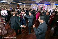 Guests have fun during the Indian wedding ceremony. Guests have fun during the Indian wedding ceremony.