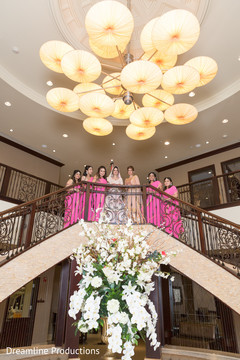 Stunning picture of the beautiful bridesmaids next to the Indian bride. Stunning picture of the beautiful bridesmaids next to the Indian bride.