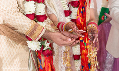 Beautiful detail of the Indian couple's hands during the ceremony. Beautiful detail of the Indian couple's hands during the ceremony.