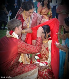 Indian groom during the sindoor with bride capture. Indian groom during the sindoor with bride capture.