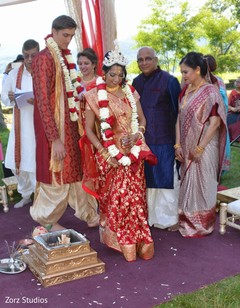 Indian bride and groom during the Agni Pradakshina ritual. Indian bride and groom during the Agni Pradakshina ritual.