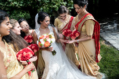 Sweet Indian bride and bridesmaids posing for photo shoot. Sweet Indian bride and bridesmaids posing for photo shoot.