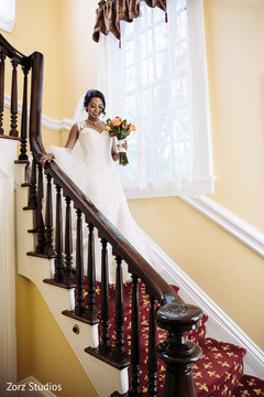 Enchanting Indian bride ready with her white wedding dress. Enchanting Indian bride ready with her white wedding dress.