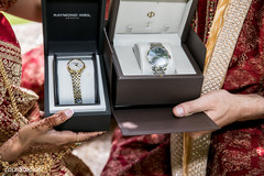 Indian bride and grooms showing their presents.