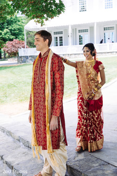 Indian bride surprising the groom portrait.