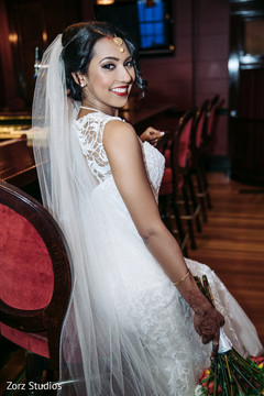 Amazing Indian bride on her ceremony white wedding dress. Amazing Indian bride on her ceremony white wedding dress.