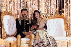 Stunning portrait of the excited Indian couple.