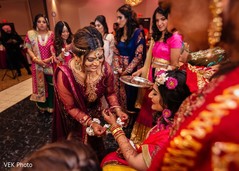 Beautiful Indian guests help the maharani with the accessories. Beautiful Indian guests help the maharani with the accessories.