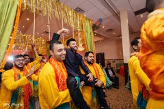 Indian groom makes his entrance along with the groomsmen.