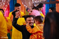 Kid dances with the groom at the Indian wedding rituals. Kid dances with the groom at the Indian wedding rituals.