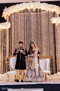 Indian newlyweds address the guests at the reception. Indian newlyweds address the guests at the reception.