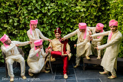Indian groom having fun with his groomsmen Indian groom having fun with his groomsmen