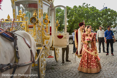 Indian newlyweds about to get inside their carriage Indian newlyweds about to get inside their carriage
