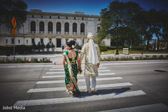 Indian bride and groom walking hand in hand. Indian bride and groom walking hand in hand.