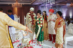 Indian bride and groom during Agni Pradakshina. Indian bride and groom during Agni Pradakshina.