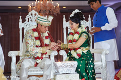 Indian lovebirds exchanging wedding rings. Indian lovebirds exchanging wedding rings.
