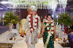 Just married Indian couple walking out. Just married Indian couple walking out.