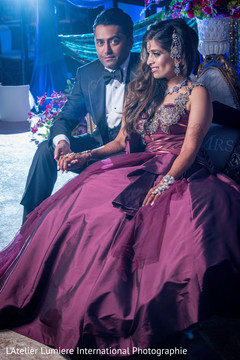 Lovely Indian couple in their reception outfits. Lovely Indian couple in their reception outfits.