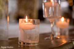 Indian wedding reception glass and candle decor. Indian wedding reception glass and candle decor.