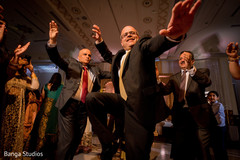Indian wedding guests showing some dance moves. Indian wedding guests showing some dance moves.