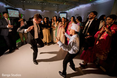 Indian wedding guests showing magnificent dance moves. Indian wedding guests showing magnificent dance moves.