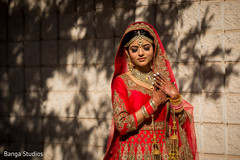 Enchanting Indian bride on her wedding ceremony outfit. Enchanting Indian bride on her wedding ceremony outfit.